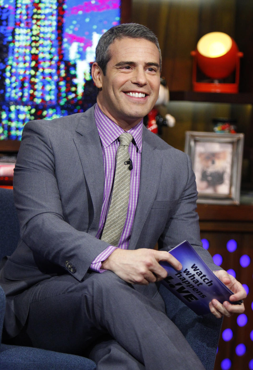 FILE - In this Jan. 9, 2012 file photo originally released by Bravo, host Andy Cohen appears on Bravo's "Watch What Happens Live" show in New York. Expanding to five nights a week this past January, "WWHL" has grown from two nights a week, and before that one night, and before that a blog Cohen posted about the shows he stewarded in his executive day job. (AP Photo/Bravo, Peter Kramer)