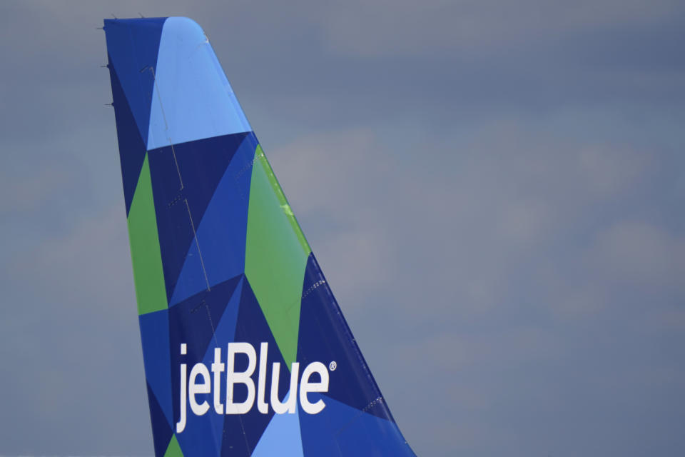 FILE - The tail of a JetBlue Airways Airbus A321 is shown as the plane prepares to take off from Fort Lauderdale-Hollywood International Airport, Tuesday, Jan. 19, 2021, in Fort Lauderdale, Fla. An Associated Press analysis found the number of publicly-traded “zombie” companies — those so laden with debt they're struggling to pay even the interest on their loans — has soared to nearly 7,000 around the world, including 2,000 in the United States. (AP Photo/Wilfredo Lee, File)