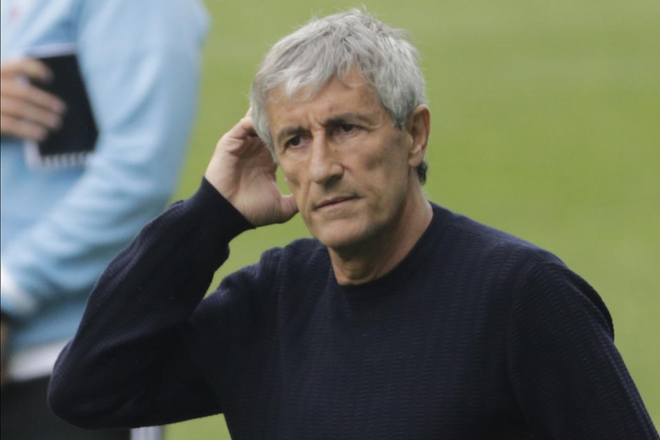 Barcelona's head coach Quique Setien gestures after the Spanish La Liga soccer match between RC Celta and Barcelona at the Balaidos stadium in Vigo, Spain, Saturday, June 27, 2020. (AP Photo/Lalo Villar)