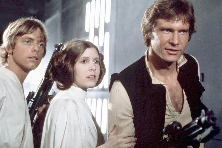 Luke Skywalker (Mark Hamill), La Princesa Leia (Carrie Fisher) y Han Solo (Harrison Ford) en Star Wars