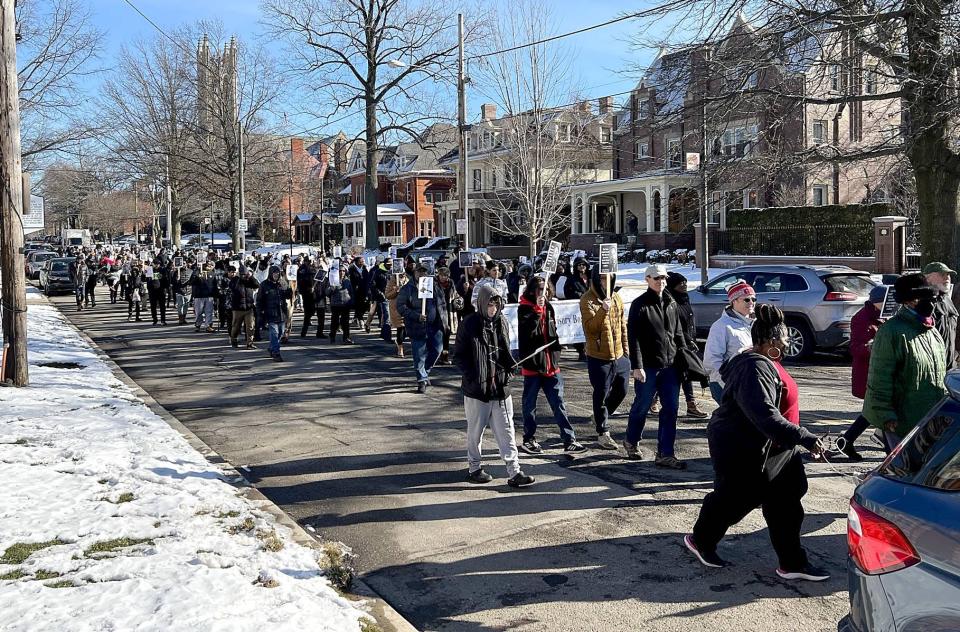 Nearly 400 people marched in the annual Martin Luther King Jr. Day march in Erie Monday afternoon.