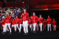 <p>TOKYO, JAPAN - JULY 23: Athletes of Team Canada parade leaded by their flag bearers Miranda Ayim and Nathan Hirayama )not in frame) during the Opening Ceremony of the Tokyo 2020 Olympic Games at Olympic Stadium on July 23, 2021 in Tokyo, Japan. (Photo by Jamie Squire/Getty Images)</p> 