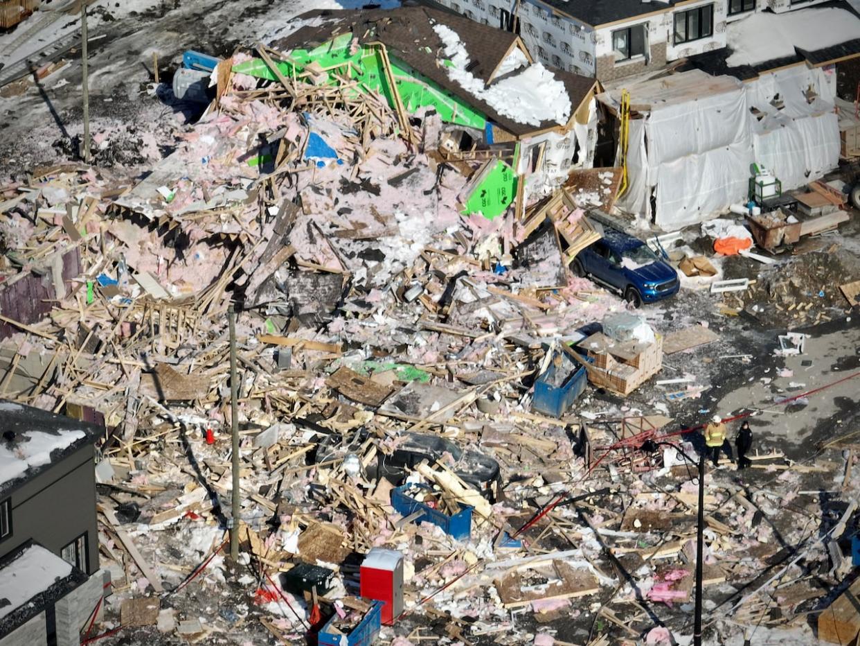 In February, four houses under construction were destroyed and several more homes damaged when a violent explosion ripped through a new development in Orléans. A judge later called it a 'miracle' that no one was killed in the early morning blast. (Felix Desroches/CBC - image credit)
