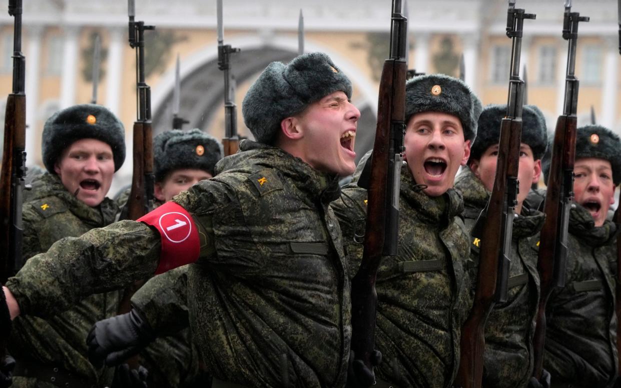 Russian troops march during a rehearsal for the Victory Day military parade which will take place at Dvortsovaya (Palace) Square on May 9