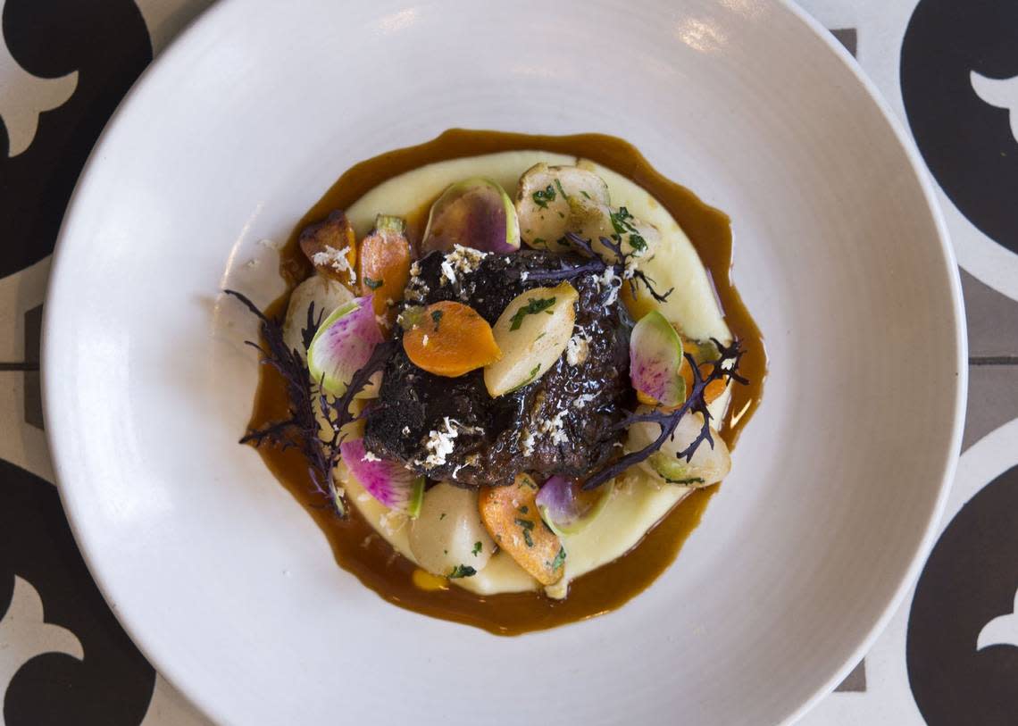 Beef short ribs served with parsnip puree, carrots, turnips, radish, horseradish, and red wine jus at Paragary’s, which reopened last summer after a $1 million renovation. Feb 9, 2016.