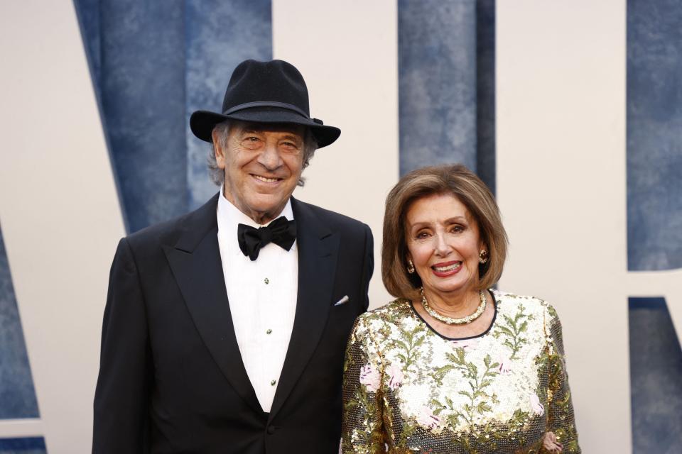 US Representative Nancy Pelosi (R), Democrat of California, and her husband Paul Pelosi attends the Vanity Fair 95th Oscars Party at the The Wallis Annenberg Center for the Performing Arts in Beverly Hills, California on March 12, 2023.