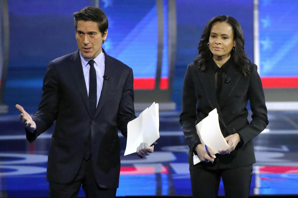 David Muir and Linsey Davis onstage before a debate in 2020. 