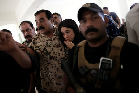 Yazidi survivor and United Nations Goodwill Ambassador for the Dignity of Survivors of Human trafficking Nadia Murad cries as she visits her village for the first time after being captured and sold as a slave by the Islamic State three years ago, in Kojo, Iraq June 1, 2017. REUTERS/Alkis Konstantinidis