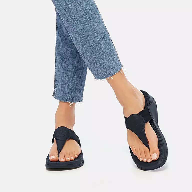 Walkstar Webbing Toe-Post Sandals in Midnight Navy. Image via Fitflop.