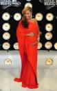 <p>Beyonce freaked everyone out when she revealed she was pregnant with her first child, Blue Ivy, in this one-shouldered orange dress in 2011.</p>