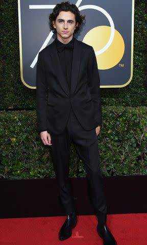 <p>Kevork Djansezian/NBCU Photo Bank/NBCUniversal/Getty</p> Timothee Chalamet arrives to the 75th Annual Golden Globe Awards on January 7, 2018.