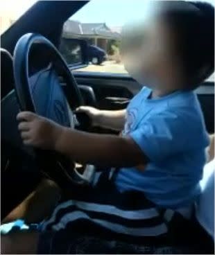 Outrage over baby behind the wheel. Screen-grab: YouTube