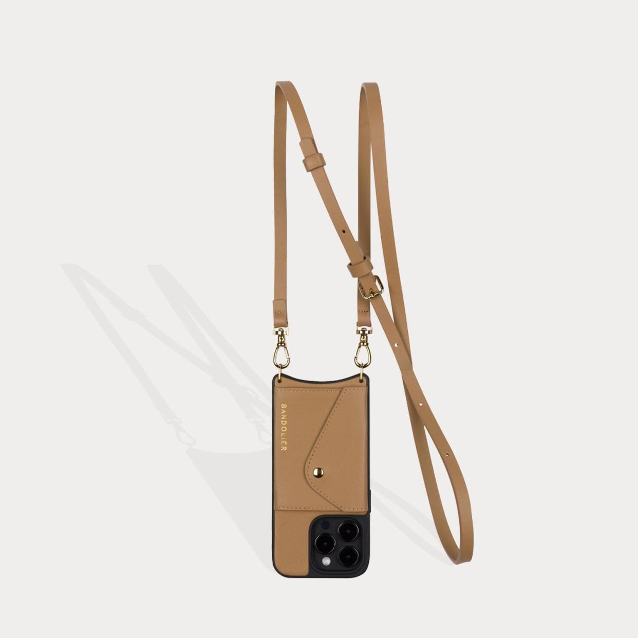 <p><a href="https://go.redirectingat.com?id=74968X1596630&url=https%3A%2F%2Fwww.bandolierstyle.com%2Fproducts%2Fdonna-side-slot-crossbody-bandolier-tan-gold&sref=https%3A%2F%2Fwww.cosmopolitan.com%2Fstyle-beauty%2Ffashion%2Fg9167931%2Fbest-gifts-for-mom%2F" rel="nofollow noopener" target="_blank" data-ylk="slk:Shop Now;elm:context_link;itc:0;sec:content-canvas" class="link rapid-noclick-resp">Shop Now</a></p><p>Side Slot Crossbody</p><p>bandolierstyle.com</p>