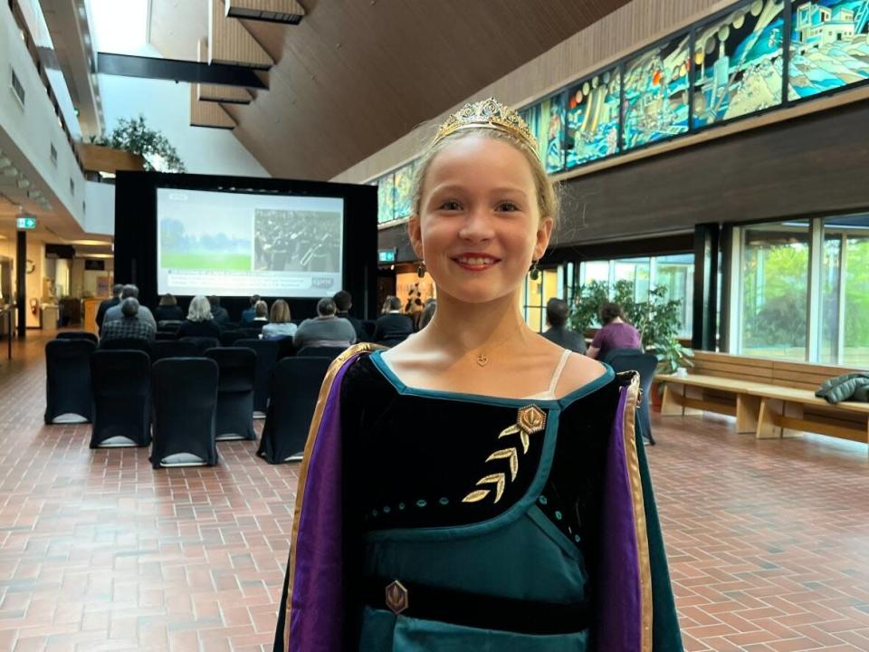 Emily Marilyn Rooke, 8, wore Frozen's Disney's princess coronation outfit to a commemorative ceremony in honour of Her late Majesty Queen Elizabeth II in Whitehorse. (Sissi De Flaviis/CBC - image credit)