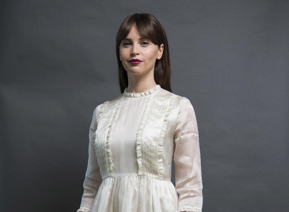 In this Dec. 4, 2016 photo, Felicity Jones, who plays Jyn Erso in "Rogue One: A Star Wars Story," poses for a photo in San Francisco. (Photo by Peter Barreras/Invision/AP)