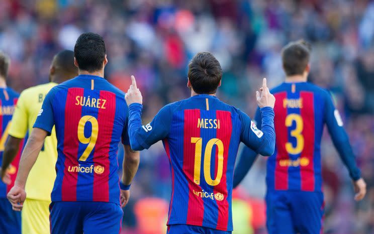 Messi celebrates one of his two goals against Villarreal. (Getty)