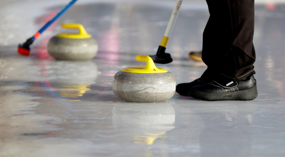 Curling stones on the ice at the Titletown Winter Games presented by U.S. Venture on Feb. 20, 2022, in Ashwaubenon, Wis.