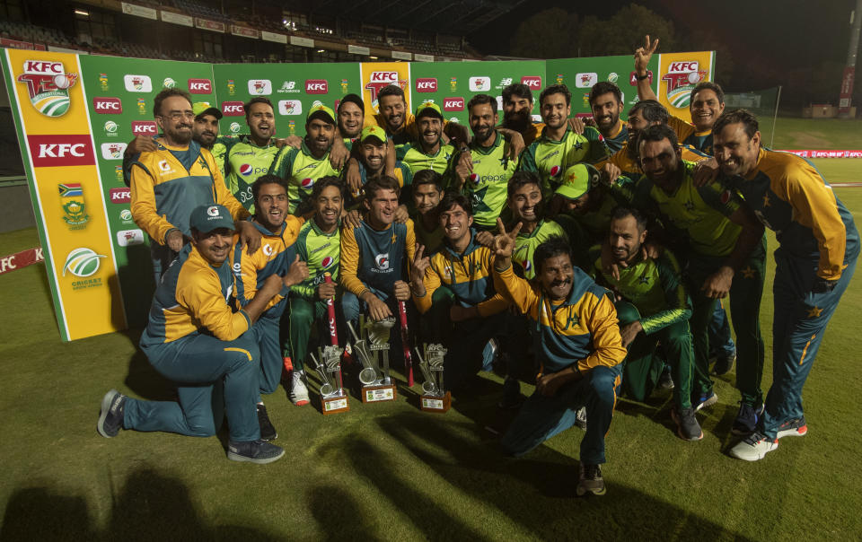 Pakistan players celebrate after winning the fourth and final T20 cricket match between South Africa and Pakistan at Centurion Park in Pretoria, South Africa, Friday, April 16, 2021. Pakistan beat South Africa by 3 wickets to win the series 3-1. (with 1 ball remaining)(AP Photo/Themba Hadebe)