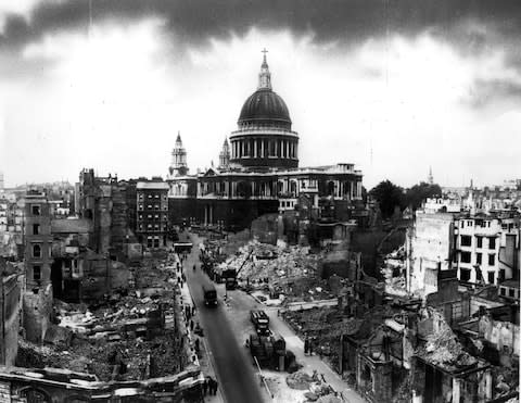 St Pauls Cathedral stands defiant following the Blitz - Credit: Getty