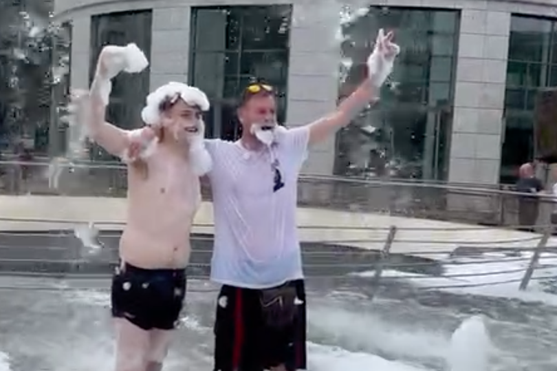 The Tartan Army partying at the water fountain in Stuttgart.