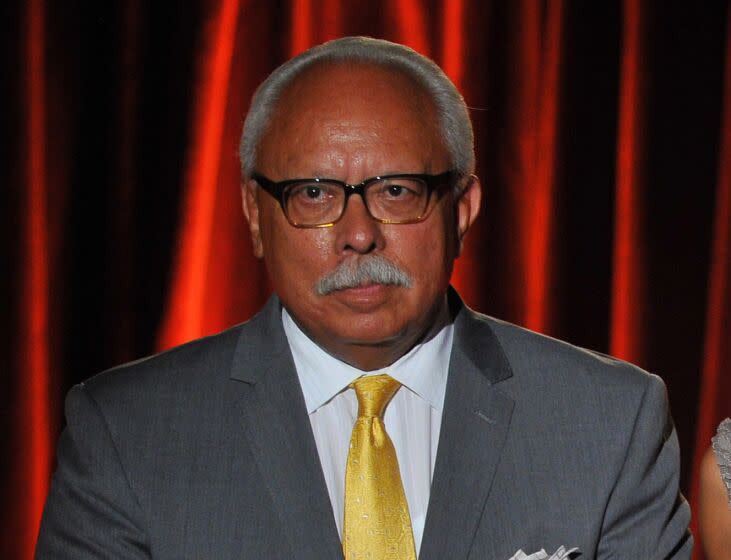 Tony Valdez and Azalea Iniguez present on stage at the Television Academy's 66th Los Angeles Area Emmy Awards on Saturday, July 26, 2014 at The Leonard H. Goldenson Theater in the NoHo Arts District in Los Angeles. (Photo by Vince Bucci/Invision for the Television Academy/AP Images)