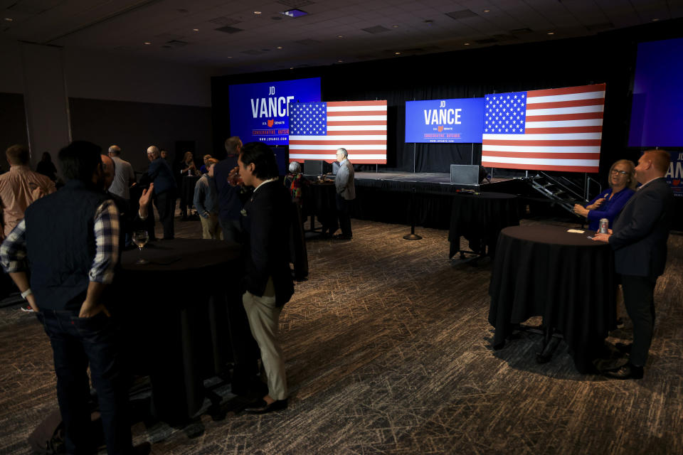 Supporters gather during an election night watch party for Republican Senate candidate JD Vance, Tuesday, May 3, 2022, in Cincinnati. (AP Photo/Aaron Doster)