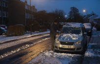 <p>Cars were covered in snow in Bristol on Wednesday morning as motorists have been warned of dangerous conditions on Britain’s roads. (SWNS) </p>