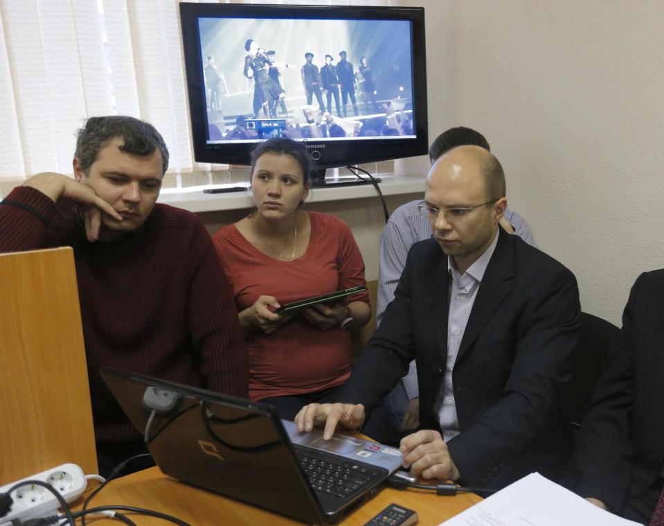 Plaintiffs present video of a Madonna concert during a court hearing in St. Petersburg, Russia, Thursday, Nov. 22, 2012. The court is considering an appeal by Russian activists who claimed that Madonna was promoting homosexuality in violation of a local law. (AP Photo/Dmitry Lovetsky)