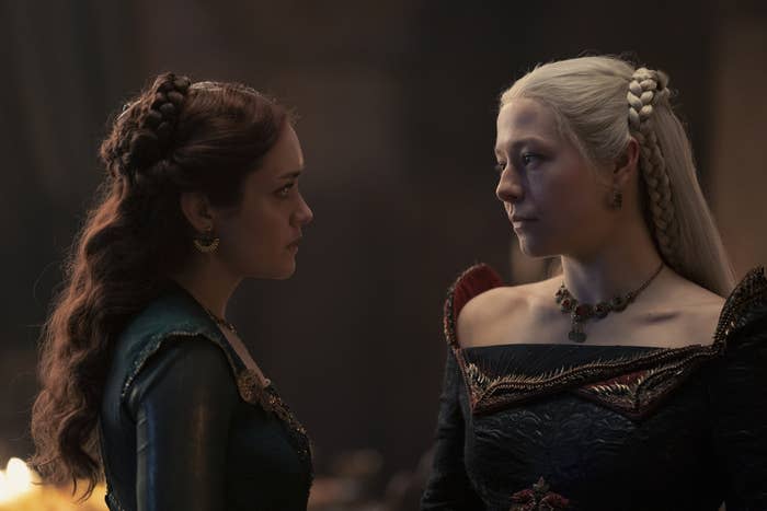 Olivia Cooke and Emma D'Arcy in period costumes, face each other in a scene from the TV show "House of the Dragon."