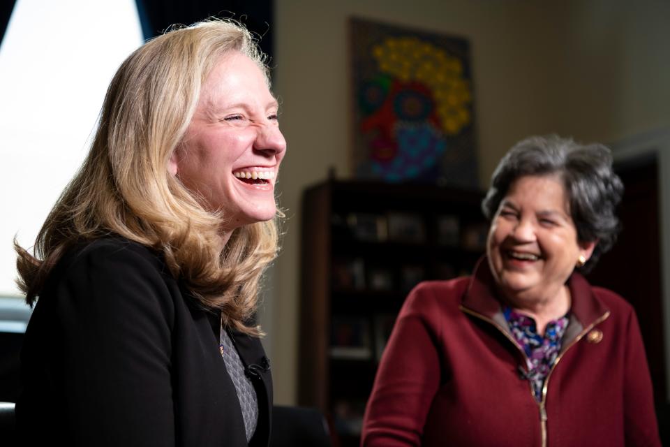 Rep. Abigail Spanberger, D-Va., left, laughs with Rep. Lois Frankel, D-Fla., in Frankel's office on April 1, 2019.