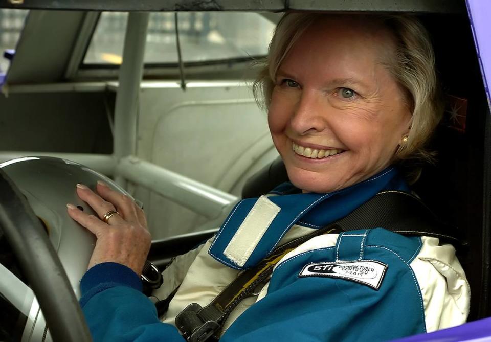 In 2006, Janet Guthrie smiles after climbing into a car to drive ceremonial laps around Charlotte Motor Speedway to commemorate the 30th anniversary of her having raced in what was then known as the World 600 at the track. Guthrie is the first woman to compete in a major superspeedway race. In 1976 Guthrie raced in the World 600 known today as the Coca-Cola 600 where she qualified in the 27th position and finished 15th. In 1977, she also became the first woman to race in the Indianapolis 500.