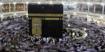 Muslims circle the Kaaba and pray during their Umrah Mawlid al-Nabawi pilgrimage, at the Grand Mosque in the holy city of Mecca January 13, 2014. Muslims mark Eid Mawlid al-Nabawi, or the birth of Prophet Mohammad on Tuesday. REUTERS/Amr Abdallah Dalsh (SAUDI ARABIA - Tags: RELIGION ANNIVERSARY TPX IMAGES OF THE DAY)