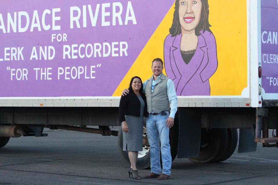 Candace Rivera, Democratic candidate for Pueblo County Clerk and Recorder, is pictured with supporter Luke Wodiuk outside a watch party at Graham's Grill Tuesday night.