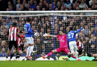 Everton's Idrissa Gueye, front right, scores his sides first goal during the English Premier League soccer match between FC Everton and FC Brentford in Liverpool, England, Saturday, April 27, 2024. (Peter Byrne/PA via AP)