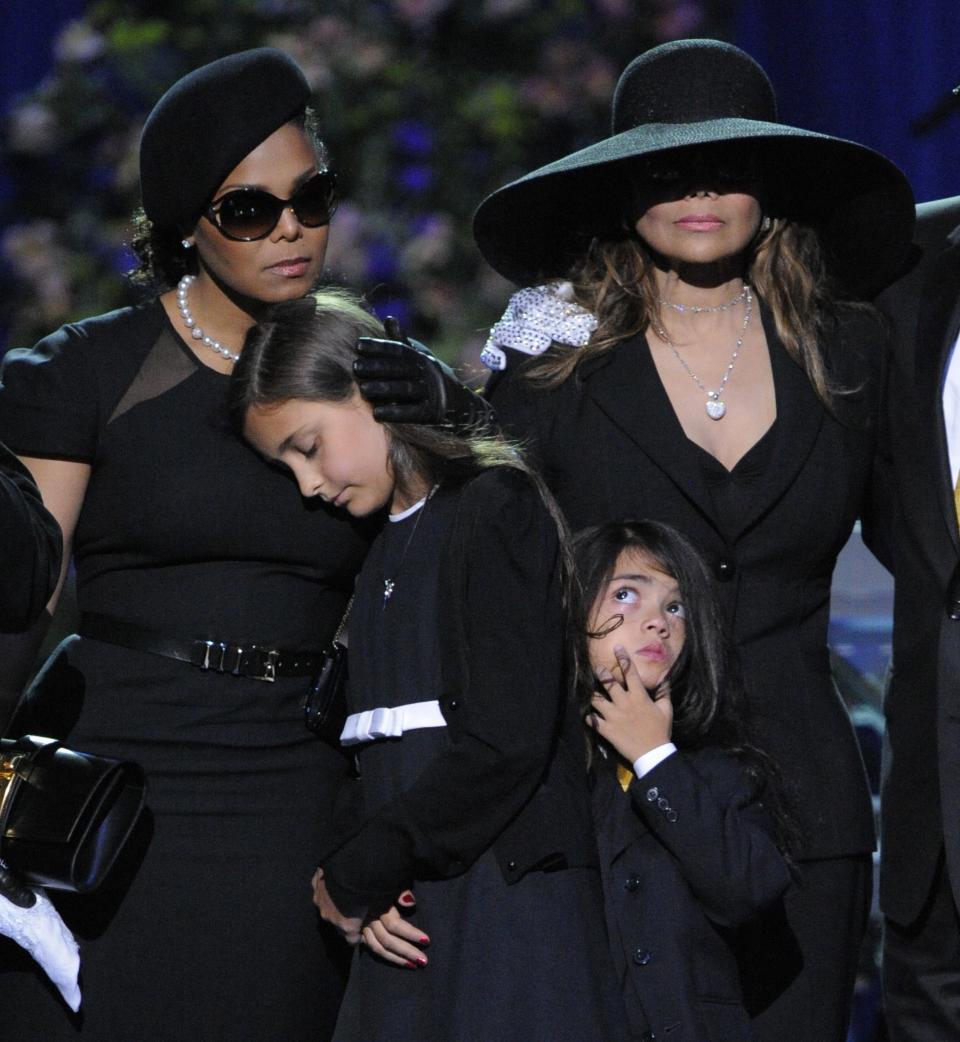 FILE - This July 7, 2009 file photo shows singer Janet Jackson, left, Paris Katherine Jackson, Prince Michael Jackson II, and LaToya Jackson on stage during the memorial service for Michael Jackson at the Staples Center in Los Angeles. Sony Electronics and the Nielsen television research company collaborated on a survey ranking TV's most memorable moments. Other TV events include, the Sept. 11 attacks in 2001, Hurricane Katrina in 2005, the O.J. Simpson murder trial verdict in 1995 and the death of Osama bin Laden in 2011. (AP Photo/Mark J. Terrill, Pool, File)