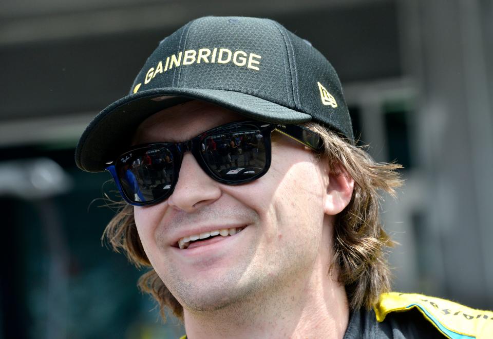 Andretti Autosport with Curb-Agajanian driver Colton Herta (26) smiles while moving about the pit area Thursday, May 19, 2022, during the third day of Indianapolis 500 practice at Indianapolis Motor Speedway. 