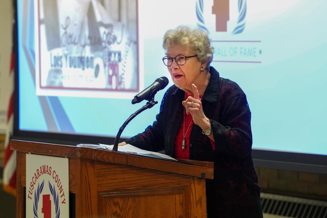 Professional baseball player Lois Young delivers remarks after being inducted into the Tuscarawas County Sports Hall of Fame.