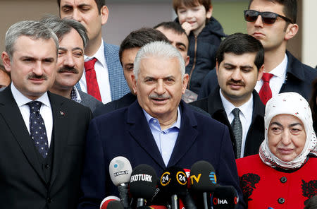 Binali Yildirim, mayoral candidate of the ruling AK Party, delivers a speech after voting in the municipal elections, outside a polling station in Istanbul, Turkey, March 31, 2019. REUTERS/Kemal Aslan