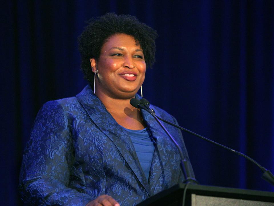 Stacey Abrams addresses the Gwinnett County Democratic Party fundraiser on Saturday, May 21, 2022, in Norcross, Ga