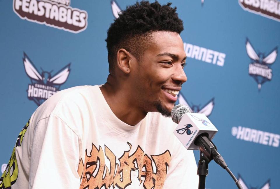 Charlotte Hornets guard/forward Brandon Miller laughs as he responds to a question during an interview with local media at Spectrum Center on Monday, April 15, 2024.