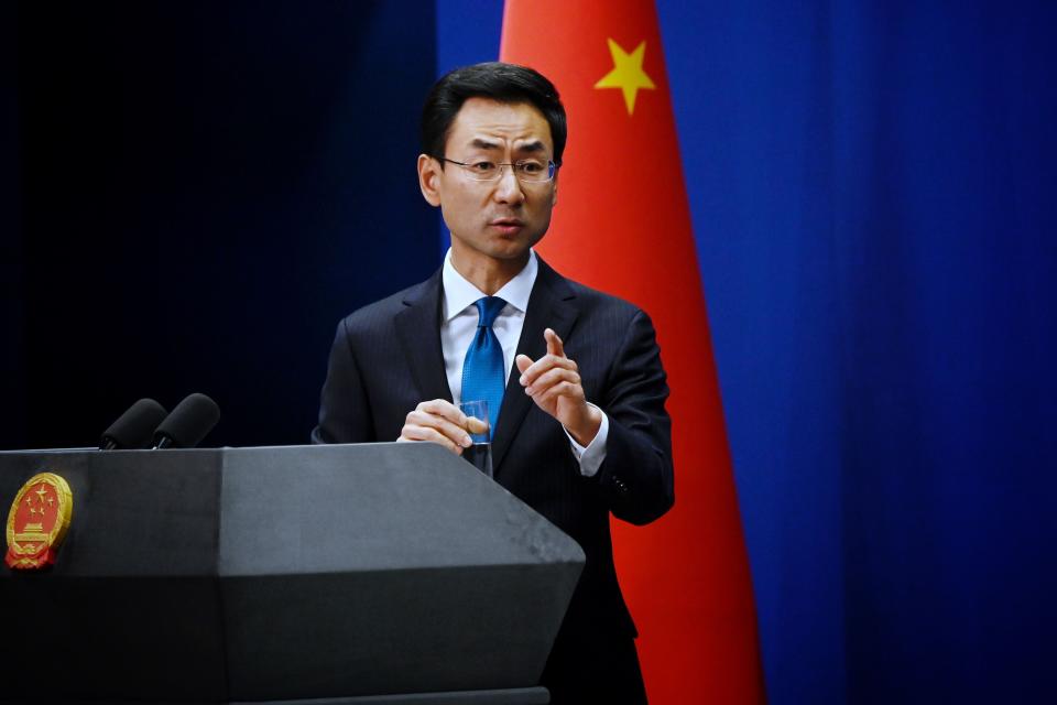 China's foreign affairs spokesman Geng Shuang answers a question during a briefing in Beijing on November 28, 2019.