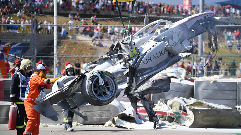 Track marshals, pictures here clearing the debris after a crash between Jack Aitken and Luca Ghiotto.