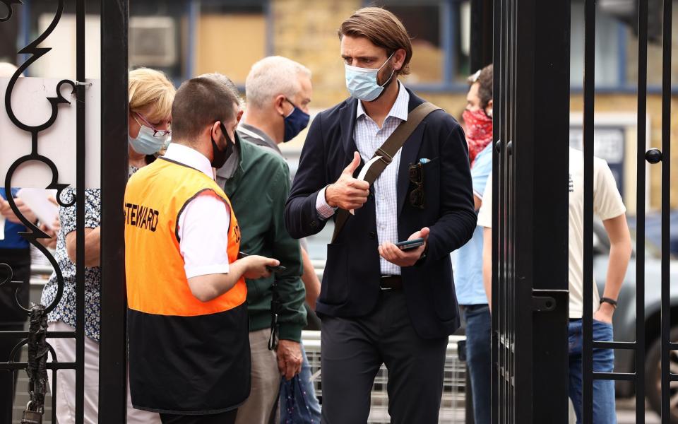 Fans scan their NHS Covid Pass to gain entry during the 2nd One Day International match between England and Sri Lanka at The Oval - Ryan Pierse/Getty Images