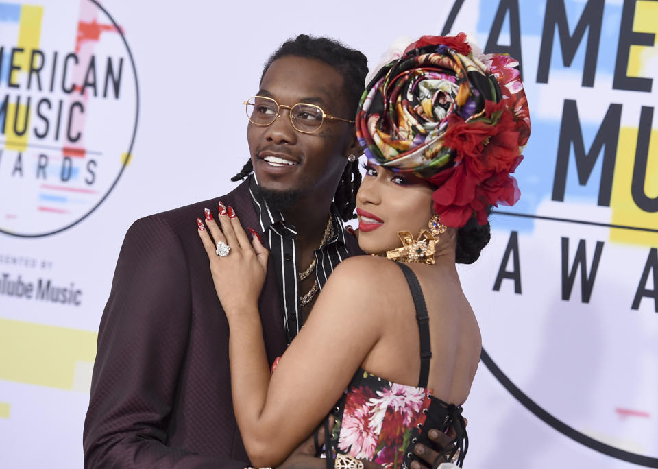 FILE - In this Oct. 9, 2018, file photo, Offset, left, and Cardi B arrive at the American Music Awards at the Microsoft Theater in Los Angeles. Cardi B has filed for divorce from Offset, claiming her marriage was “irretrievably broken.” A Fulton County Courthouse filing states that she filed the divorce documents Tuesday in Atlanta. (Photo by Jordan Strauss/Invision/AP, File)