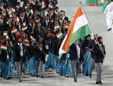 Flag bearer of India Sardar Singh leads the team into the Opening Ceremony of the 17th Asian Games in Incheon September 19, 2014. REUTERS/Issei Kato