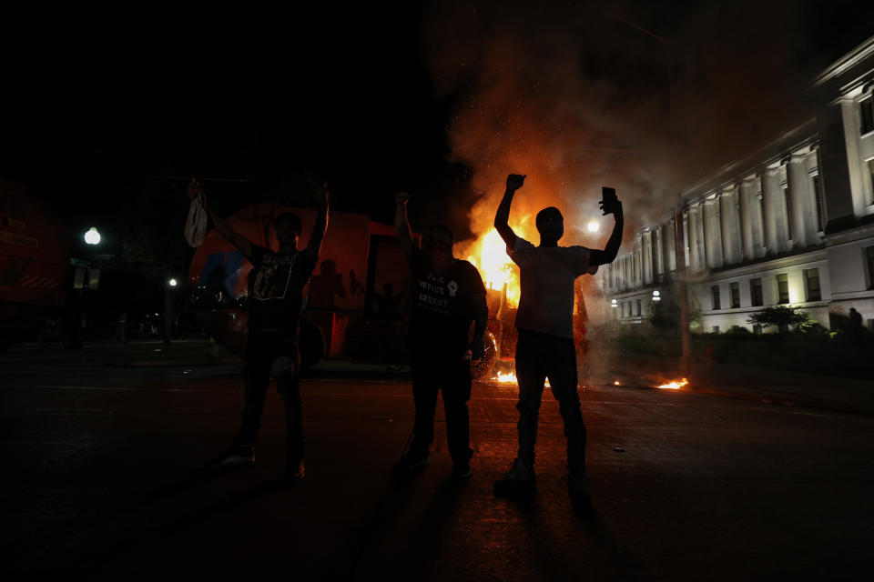 Protesters in response to the police shooting of Jacob Blake light a cleaning truck on fire in Kenosha, Wisconsin, on Aug. 24. (Photo: Tayfun Coskun/Anadolu Agency via Getty Image)