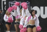 <p>Oakland Raiders cheerleaders wear pink for breast cancer awareness before an NFL football game between the Oakland Raiders and the Kansas City Chiefs in Oakland, Calif., Sunday, Oct. 16, 2016. (AP Photo/Marcio Jose Sanchez) </p>