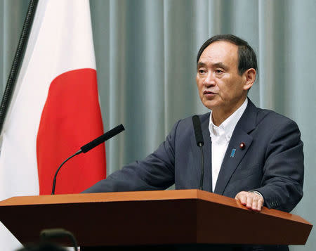 Japan's Chief Cabinet Secretary Yoshihide Suga speaks at a news conference about North Korea's missile launch in Tokyo, Japan in this photo taken by Kyodo on September 15, 2017. Mandatory credit Kyodo/via REUTERS ATTENTION EDITORS - THIS IMAGE WAS PROVIDED BY A THIRD PARTY. MANDATORY CREDIT. JAPAN OUT. NO COMMERCIAL OR EDITORIAL SALES IN JAPAN.