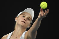 FILE - Australia's Ash Barty serves to Danielle Collins, of the U.S. during the women's singles final at the Australian Open tennis championships in Melbourne, Australia, Saturday, Jan. 29, 2022. Next week, Barty won’t be defending the Australian Open title she won last January. Shocking everyone except a few close friends and family, she announced her retirement in March. (AP Photo/Andy Brownbill)