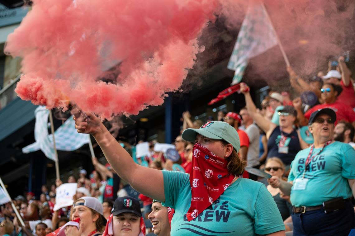 Fans celebrate after a Kansas City Current goal during Sunday evening’s match at Children’s Mercy Park in Kansas City, Kansas.